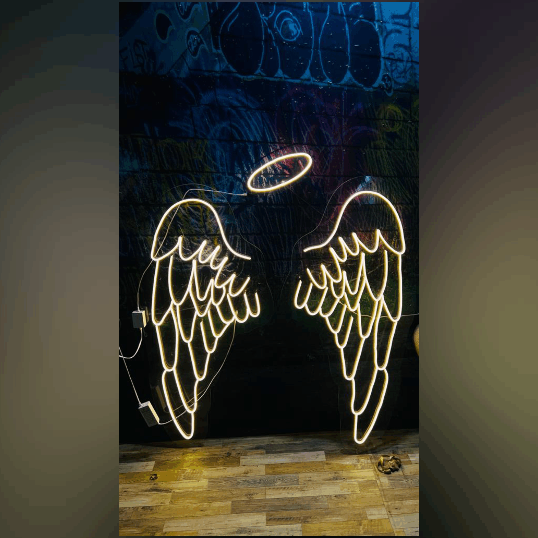 neon wings with ring sign
